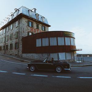 Preview wallpaper car, cabriolet, building, trip