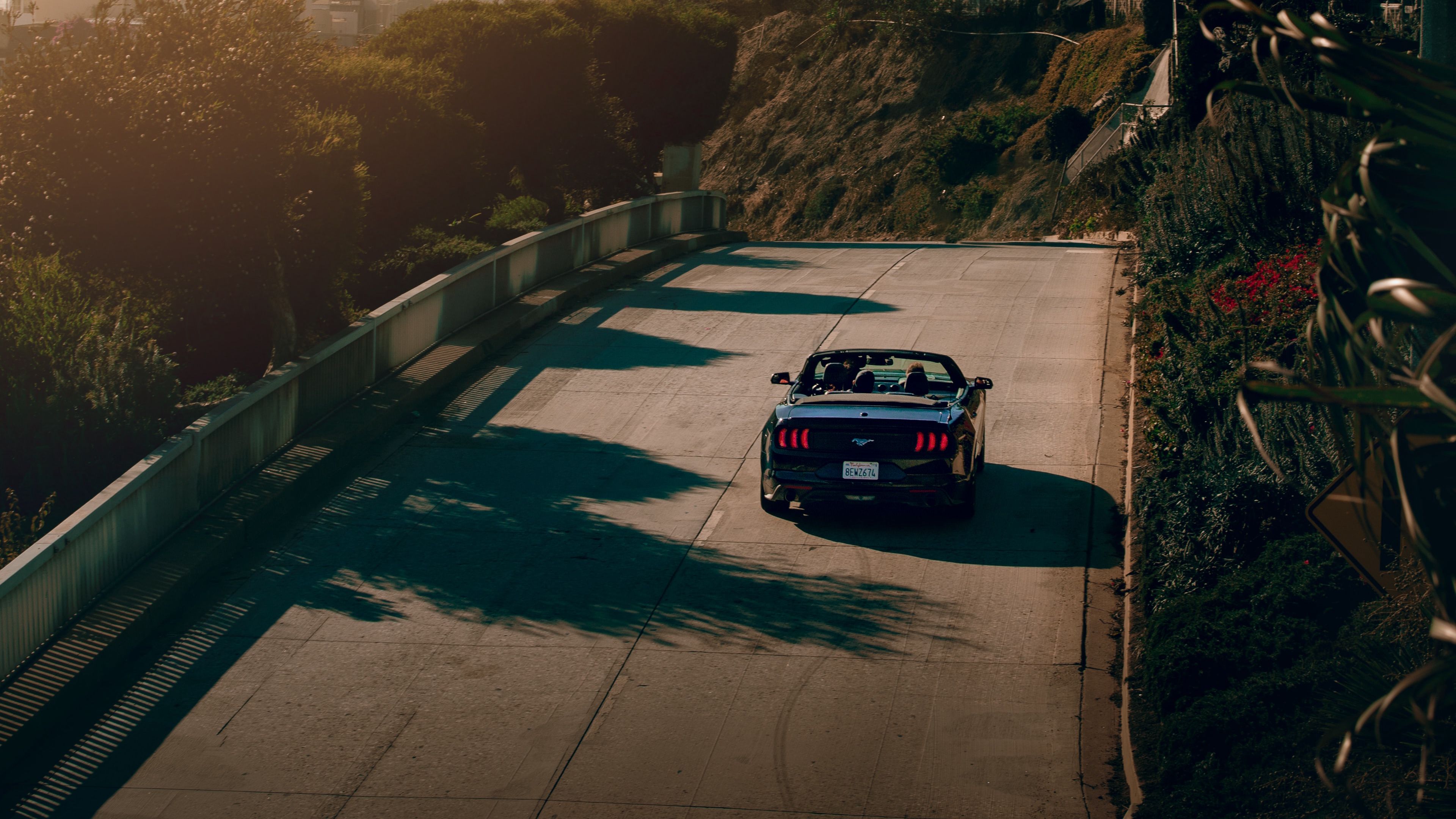 Download wallpaper 3840x2160 car, convertible, road, palm trees 4k uhd