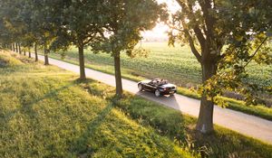 Preview wallpaper car, convertible, road, sunlight, nature