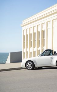 Preview wallpaper car, convertible, white, side view, building