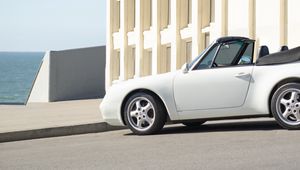 Preview wallpaper car, convertible, white, side view, building