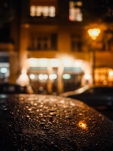 Preview wallpaper car, drops, rain, blur, lantern