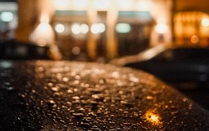 Preview wallpaper car, drops, rain, blur, lantern