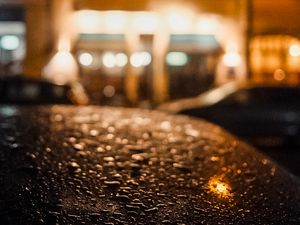 Preview wallpaper car, drops, rain, blur, lantern