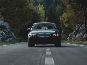 Preview wallpaper car, front view, road, trees, forest