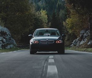 Preview wallpaper car, front view, road, trees, forest