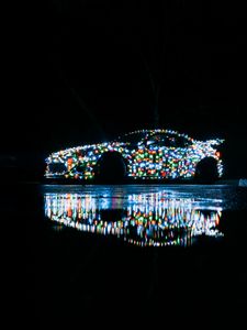 Preview wallpaper car, garland, glow, reflection, night