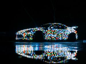 Preview wallpaper car, garland, glow, reflection, night
