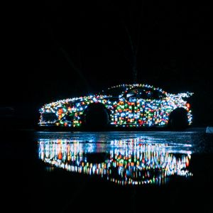 Preview wallpaper car, garland, glow, reflection, night