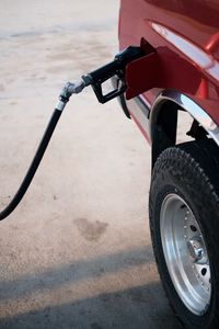 Preview wallpaper car, gas station, wheel, red