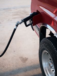 Preview wallpaper car, gas station, wheel, red