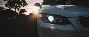 Preview wallpaper car, gray, headlight, sunlight, glare