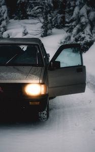 Preview wallpaper car, gray, road, snow, winter