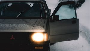 Preview wallpaper car, gray, road, snow, winter