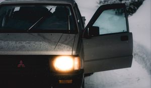 Preview wallpaper car, gray, road, snow, winter