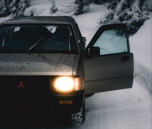 Preview wallpaper car, gray, road, snow, winter