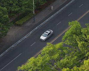 Preview wallpaper car, gray, road, trees, aerial view