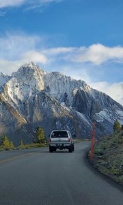 Preview wallpaper car, gray, road, mountains