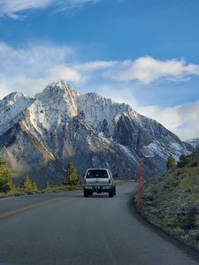 Preview wallpaper car, gray, road, mountains