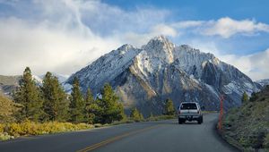 Preview wallpaper car, gray, road, mountains