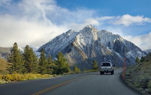 Preview wallpaper car, gray, road, mountains