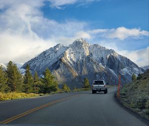 Preview wallpaper car, gray, road, mountains