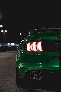 Preview wallpaper car, green, lights, backlight, back view, night