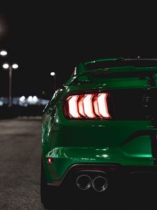 Preview wallpaper car, green, lights, backlight, back view, night