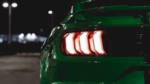 Preview wallpaper car, green, lights, backlight, back view, night