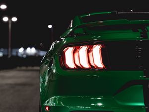 Preview wallpaper car, green, lights, backlight, back view, night