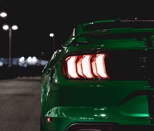 Preview wallpaper car, green, lights, backlight, back view, night