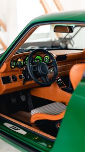 Preview wallpaper car, green, steering wheel, salon