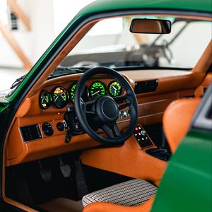 Preview wallpaper car, green, steering wheel, salon