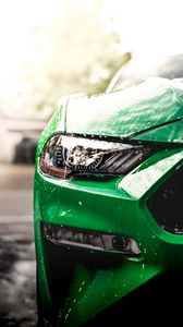 Preview wallpaper car, green, wet, headlight, front view