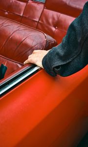 Preview wallpaper car, hand, seat, red