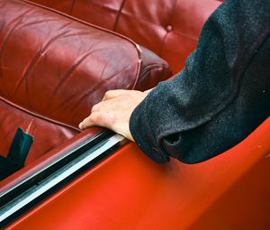 Preview wallpaper car, hand, seat, red