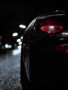 Preview wallpaper car, headlight, drops, moisture, night, dark