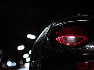 Preview wallpaper car, headlight, drops, moisture, night, dark