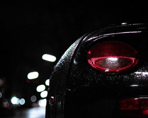 Preview wallpaper car, headlight, drops, moisture, night, dark
