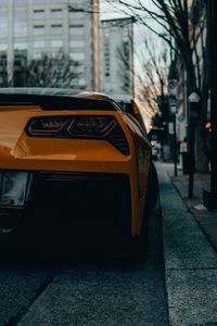 Preview wallpaper car, headlight, rear view, orange