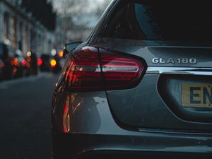 Preview wallpaper car, headlight, rear view, evening