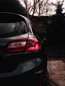 Preview wallpaper car, headlight, rear view, black
