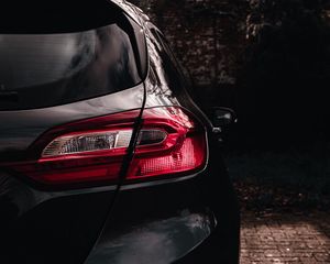 Preview wallpaper car, headlight, rear view, black