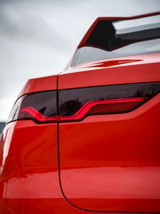 Preview wallpaper car, headlight, red, rear view, closeup