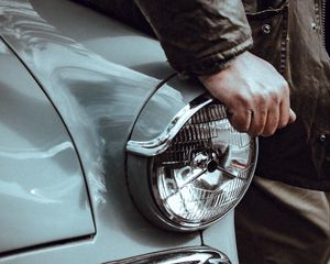 Preview wallpaper car, headlight, retro, hand