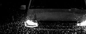 Preview wallpaper car, headlights, bw, rain, drops