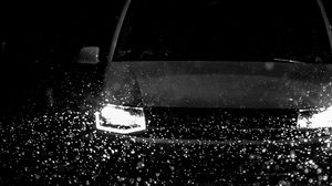 Preview wallpaper car, headlights, bw, rain, drops