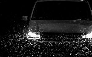 Preview wallpaper car, headlights, bw, rain, drops