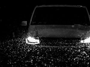 Preview wallpaper car, headlights, bw, rain, drops