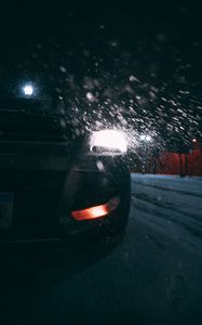 Preview wallpaper car, headlights, rear view, snow, night